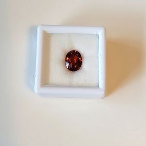 Loose orange spessartite garnet stone, 9x7mm